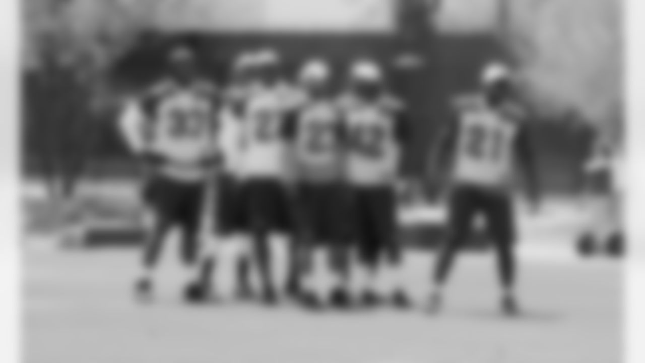 The defensive backs wait to go