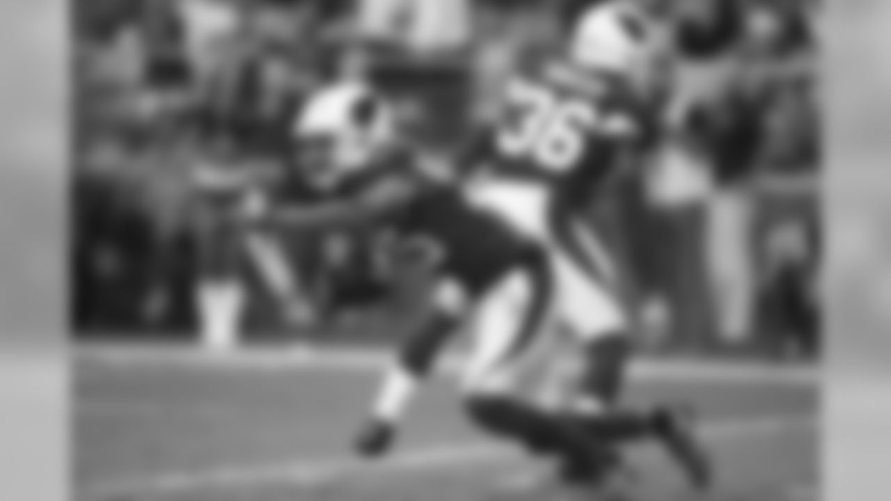 CB Tramon Williams runs after making the interception