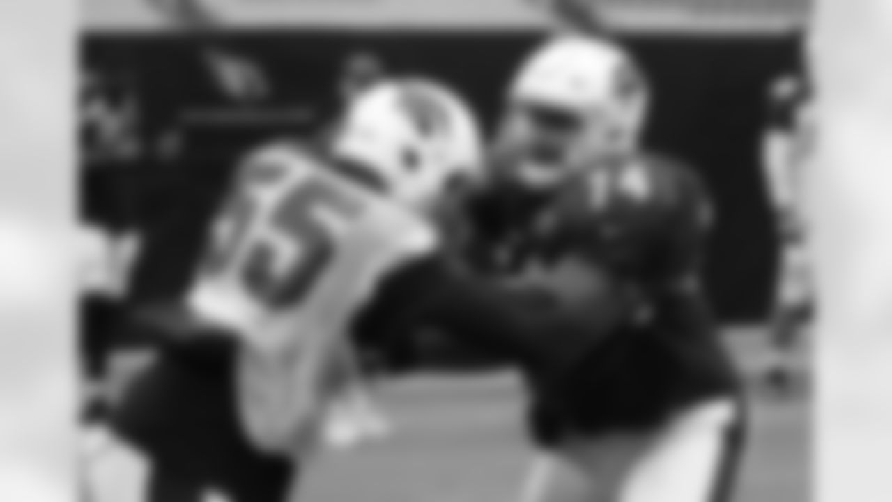 Day 3: T D.J. Humphries (right) takes on LB Chandler Jones (left)