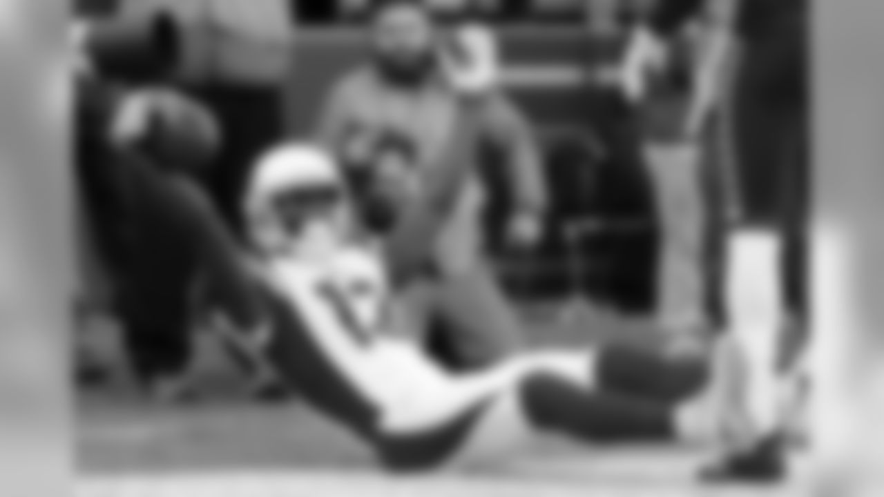 Arizona Cardinals wide receiver Jaron Brown celebrates after making a catch for a touchdown against the Seattle Seahawks in the first half of an NFL football game, Sunday, Dec. 31, 2017, in Seattle.