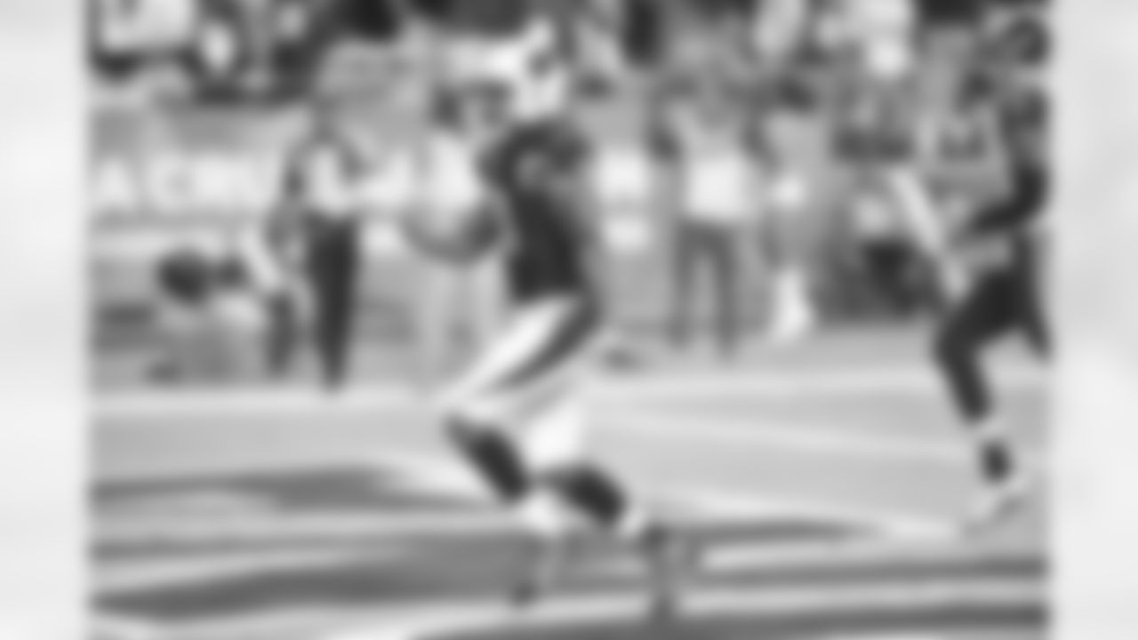 Johnson scores on a touchdown catch against the Rams