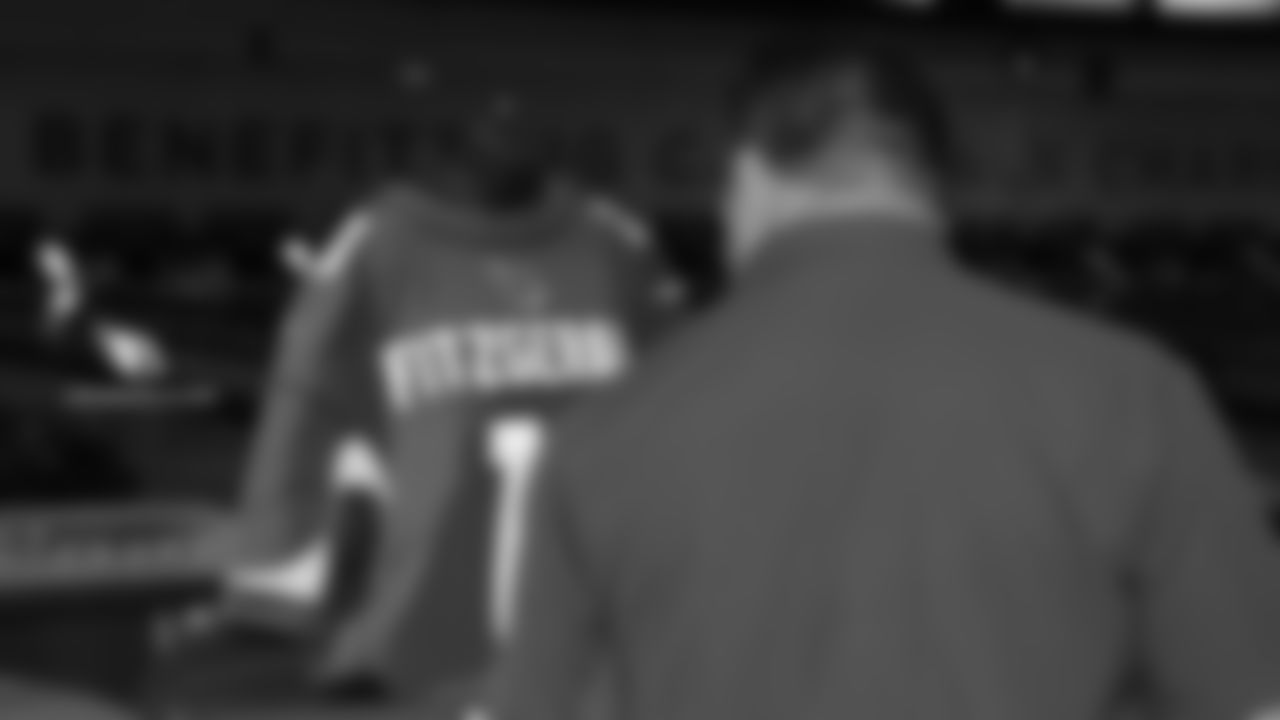 Checking out a Larry Fitzgerald autographed jersey up for auction