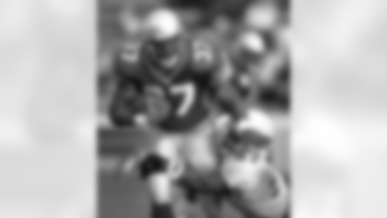 2001: Seahawks RB Shaun Alexander is brought down by LB Ronald McKinnon