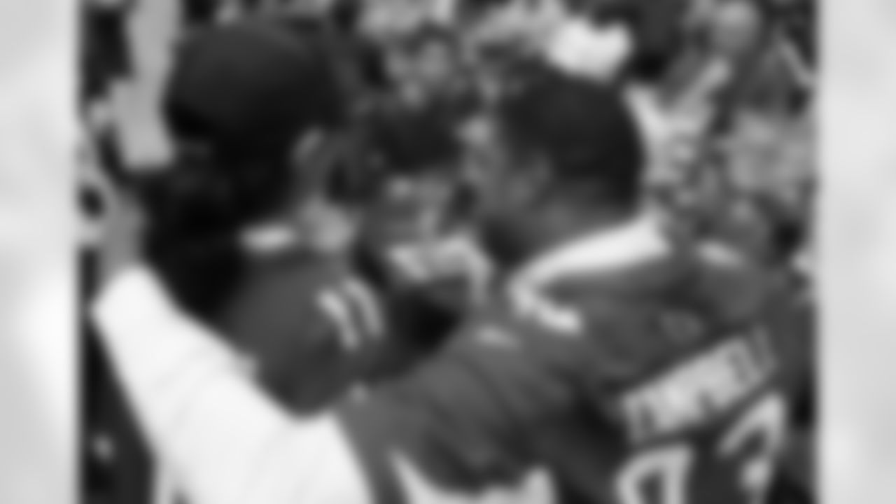 DE Calais Campbell with a young fan