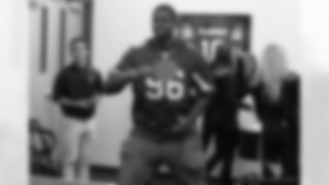 LB Kareem Martin playing ping-pong in the community center