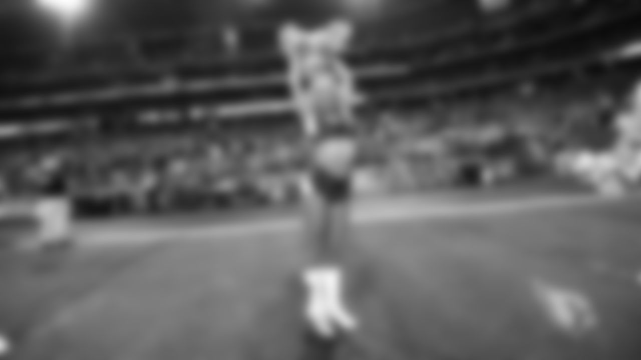 Images of Cardinals cheerleader Davis during the 2019 season
