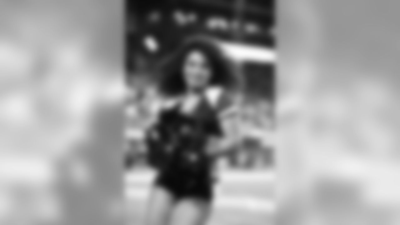 Images of Cardinals cheerleader Tequasia during the 2019 season
