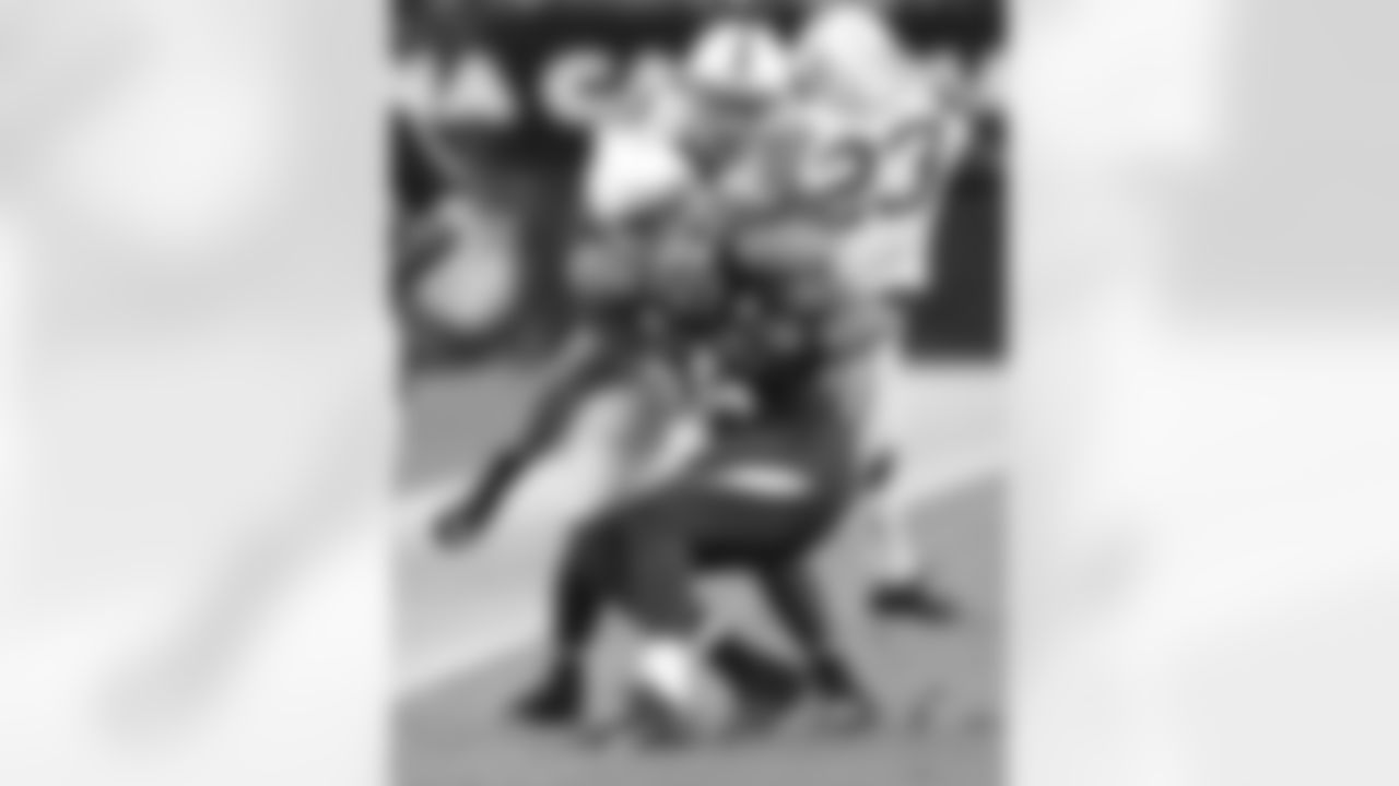 Rob Housler is brought down after catching a pass.