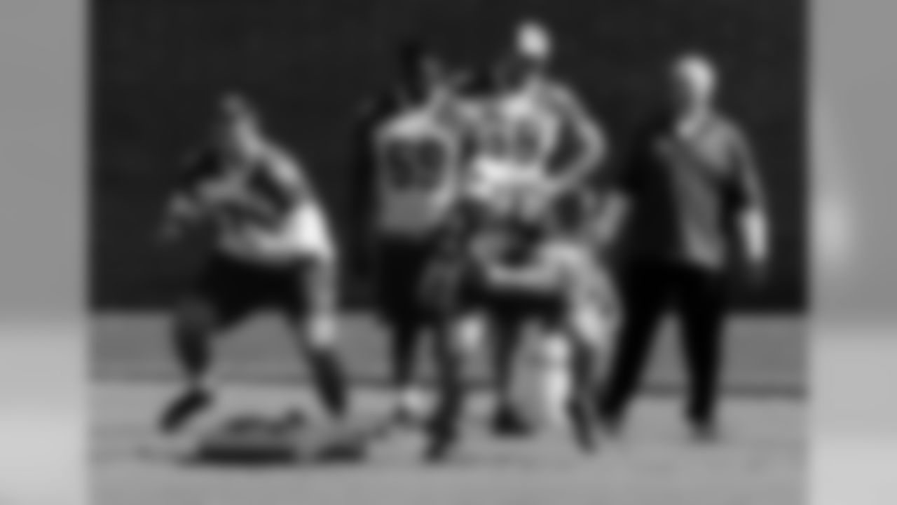 T Bradley Sowell (79) and TE John Carlson (89)