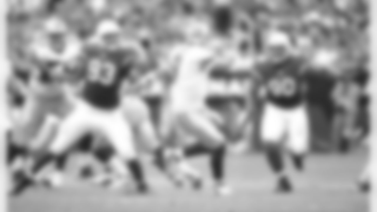 Calais Campbell and Darnell Dockett close in