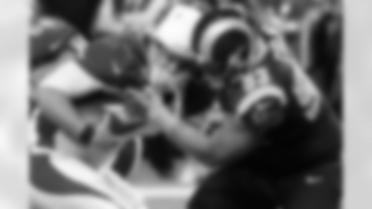 2012: QB Kevin Kolb is sacked by the Rams' Jermelle Cudjo