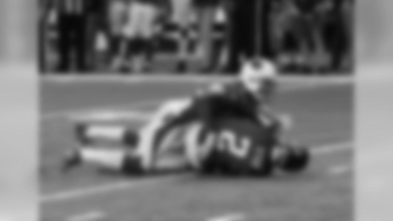 CB Patrick Peterson brings down Falcons QB Matt Ryan
