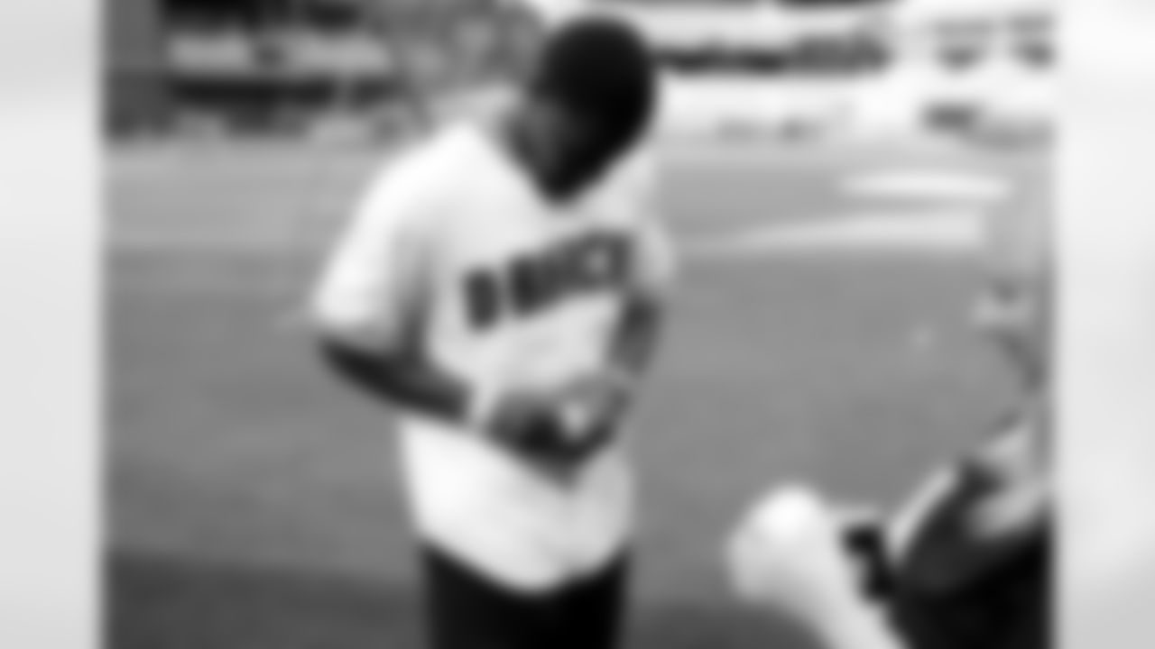 David Johnson signs a baseball for the DBacks