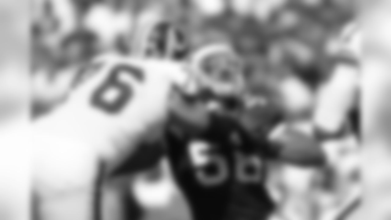 Chike Okeafor #56 of the Arizona Cardinals is blocked by Jon Jansen #76 of Washington at FedEx Field September 21 in Landover, Maryland. Washington won 24-17.