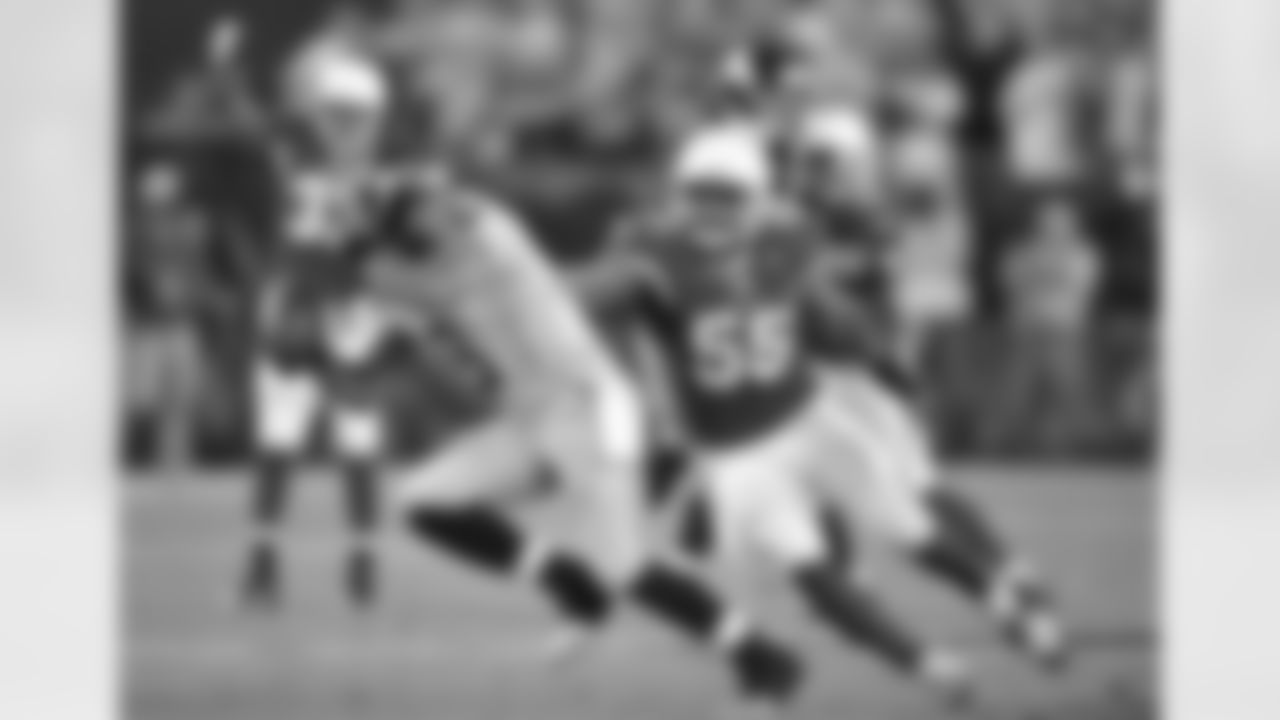 LB John Abraham registers two sacks and two forced fumbles against the Seahawks.