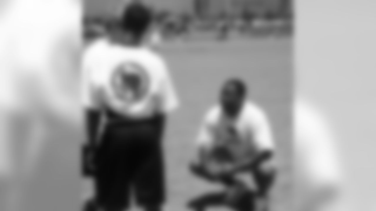 Frank Sanders takes a knee