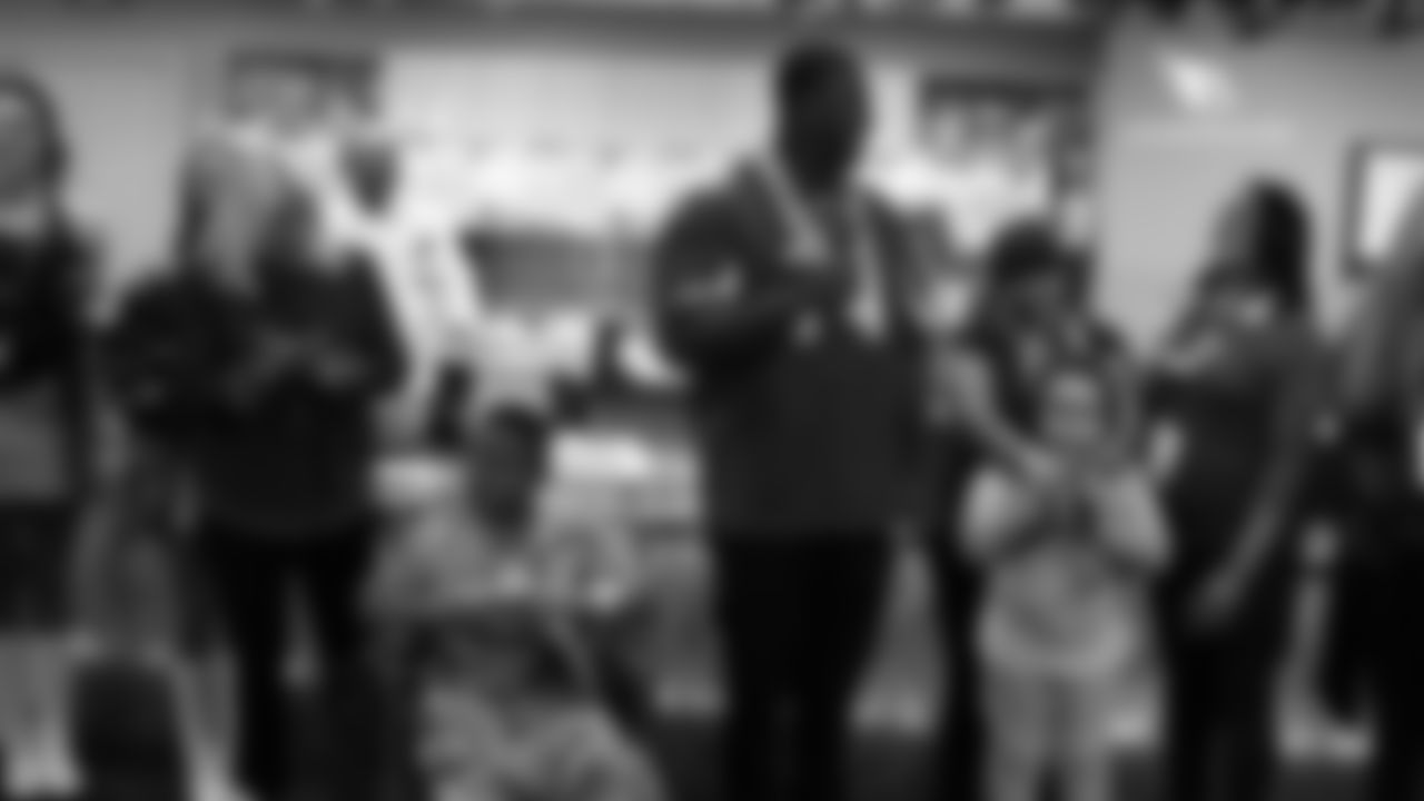 LT D.J. Humphries leads the singing of 'Happy Birthday'