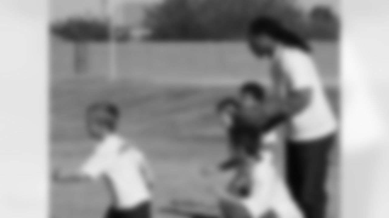 Larry plays with Jacobs class on the playground