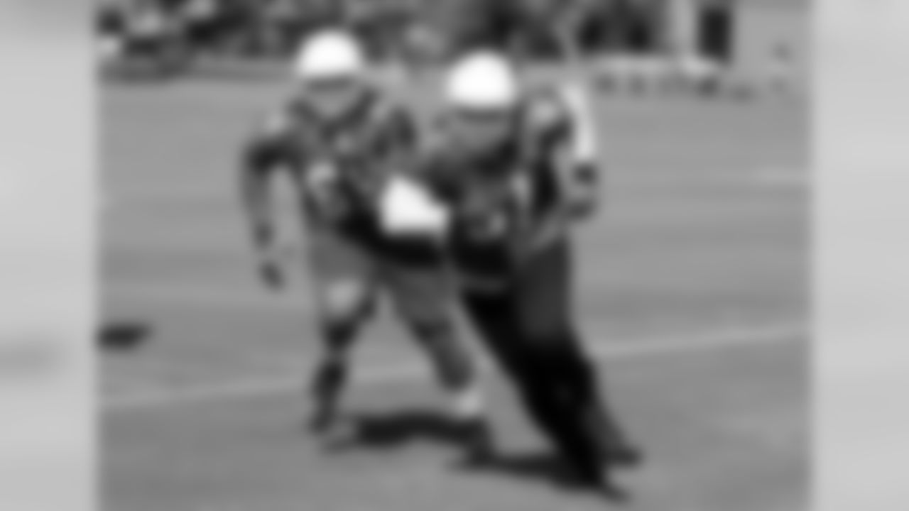 DE Matt Shaughnessy (right) and DT Xavier Williams