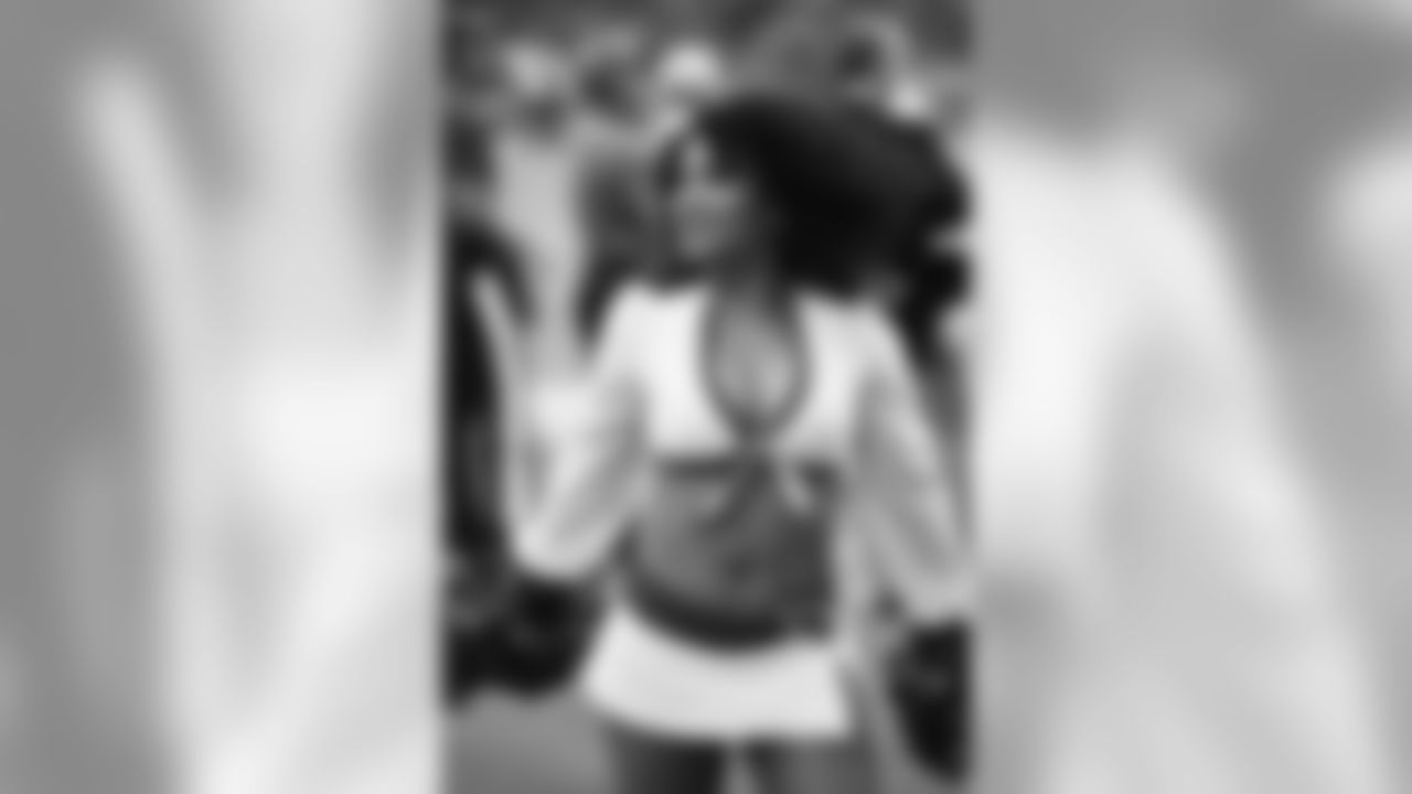 Images of Cardinals cheerleader Tequasia during the 2019 season