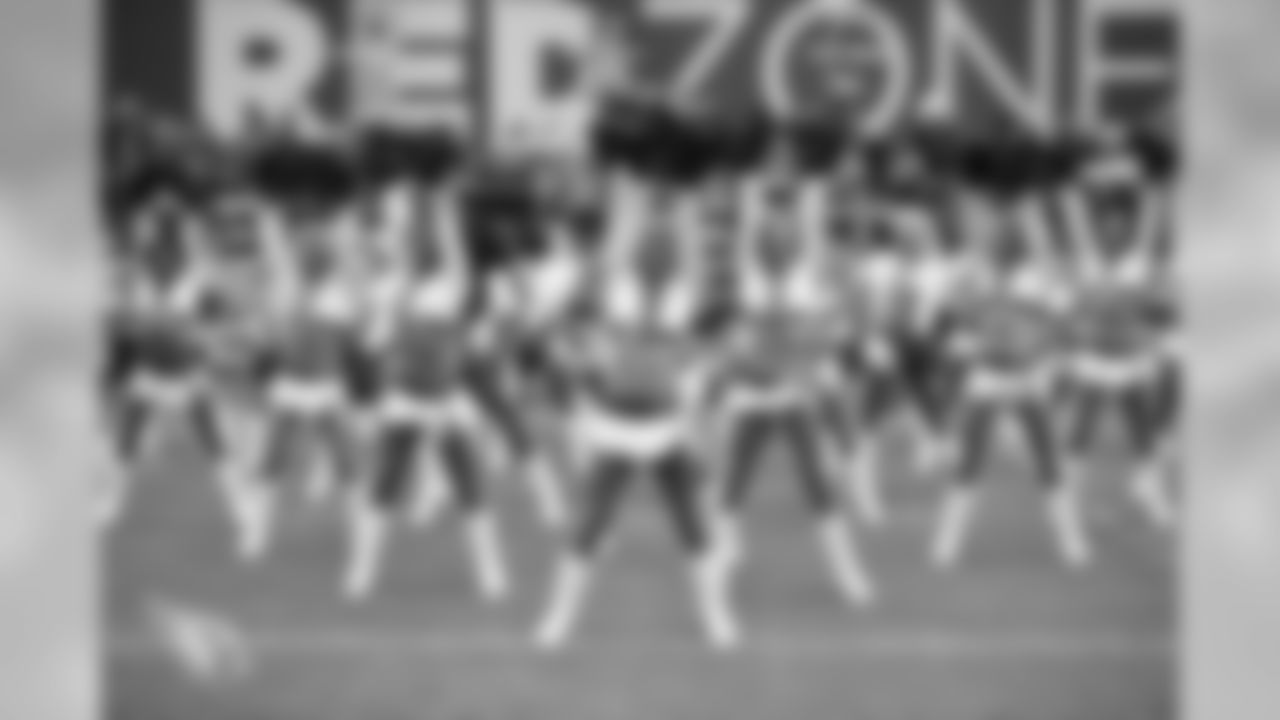 Images of the Cardinals cheerleaders from halftime and other moments at the home opener