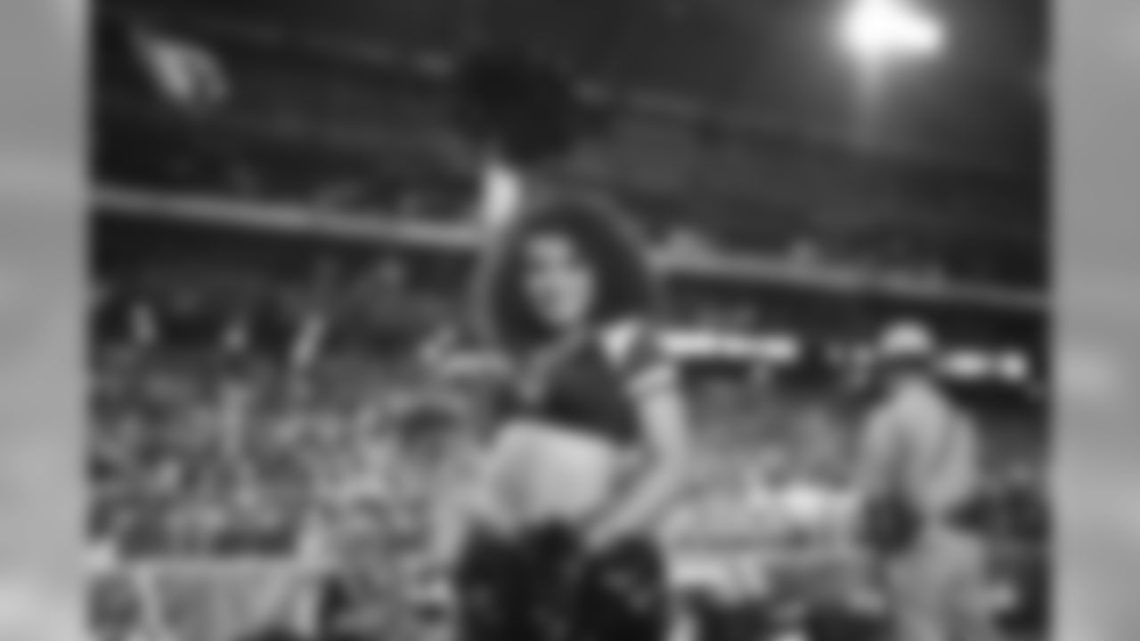 Images of Cardinals cheerleader Tequasia during the 2019 season