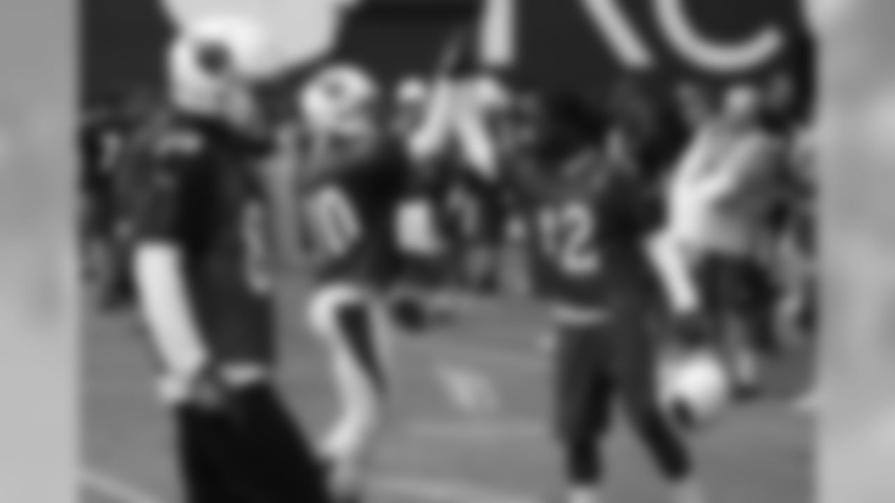 WRs Brittan Golden (10) and John Brown (12) high-five
