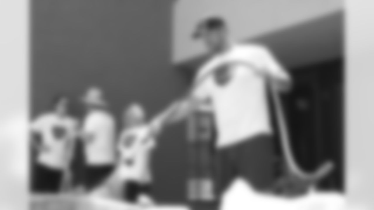 The Arizona Cardinals volunteer the Center of Opportunity homeless shelter with the University of Arizona football team during the Cardinals Caravan on Tuesday, June 1, 2023 in Tucson, AZ.