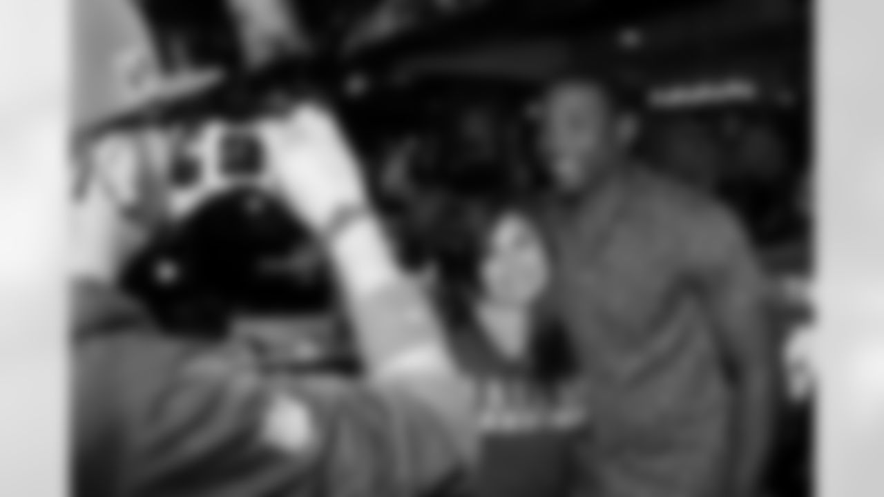 Patrick Peterson takes a picture with a fan