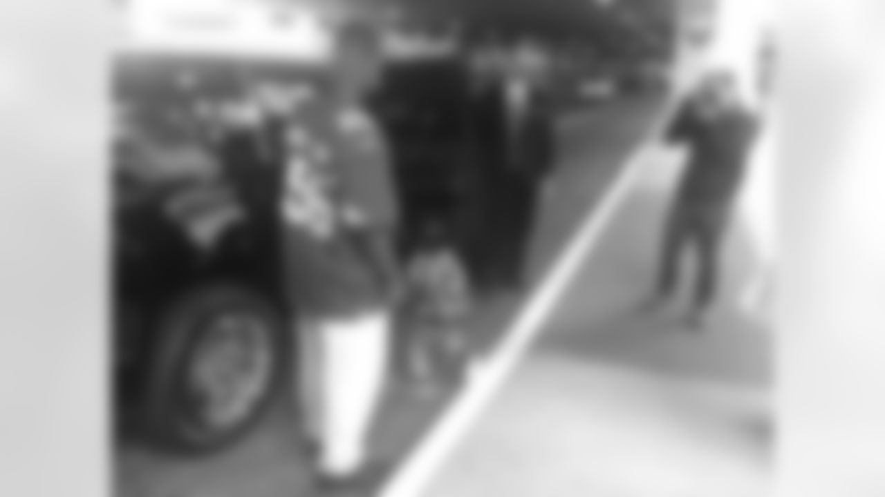 Christian and his family picked up by a limo at the airport