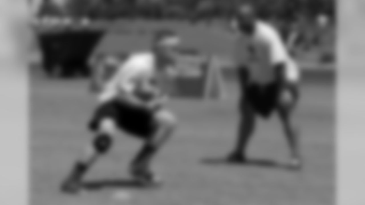 Marcel Shipp watches a running back