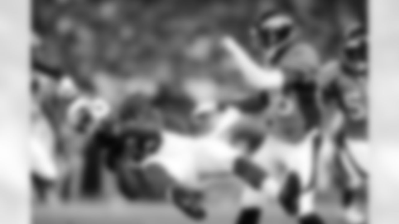 WR Jaron Brown absorbs a hit (Associated Press)
