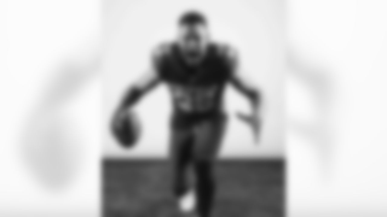 Arizona Cardinals linebacker Zaven Collins (25) poses for a photo during a photoshoot for the 2023 Arizona Cardinals Uniforms on Thursday, April 13, 2023.