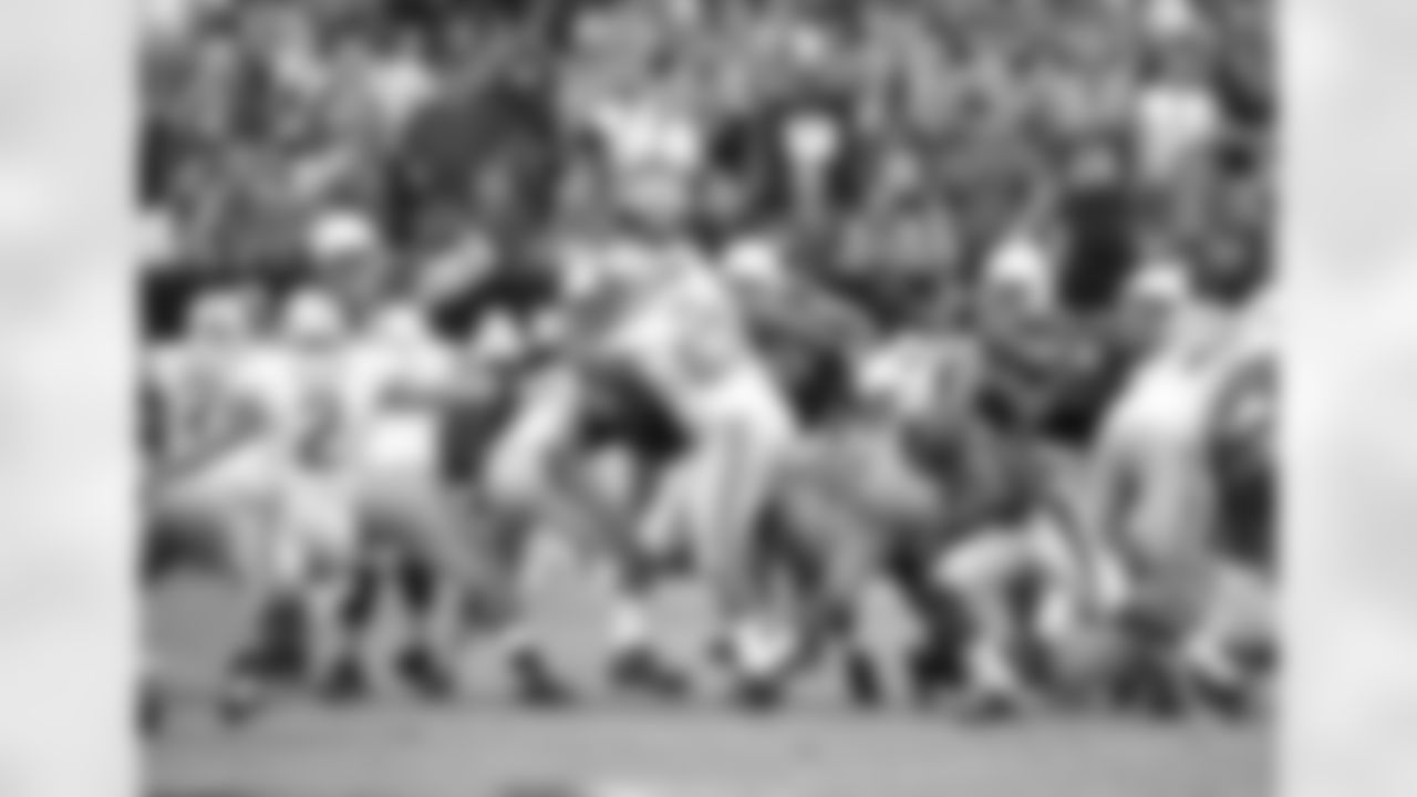Bethel gets around the edge and prepares to block a Lions field goal attempt in 2013
