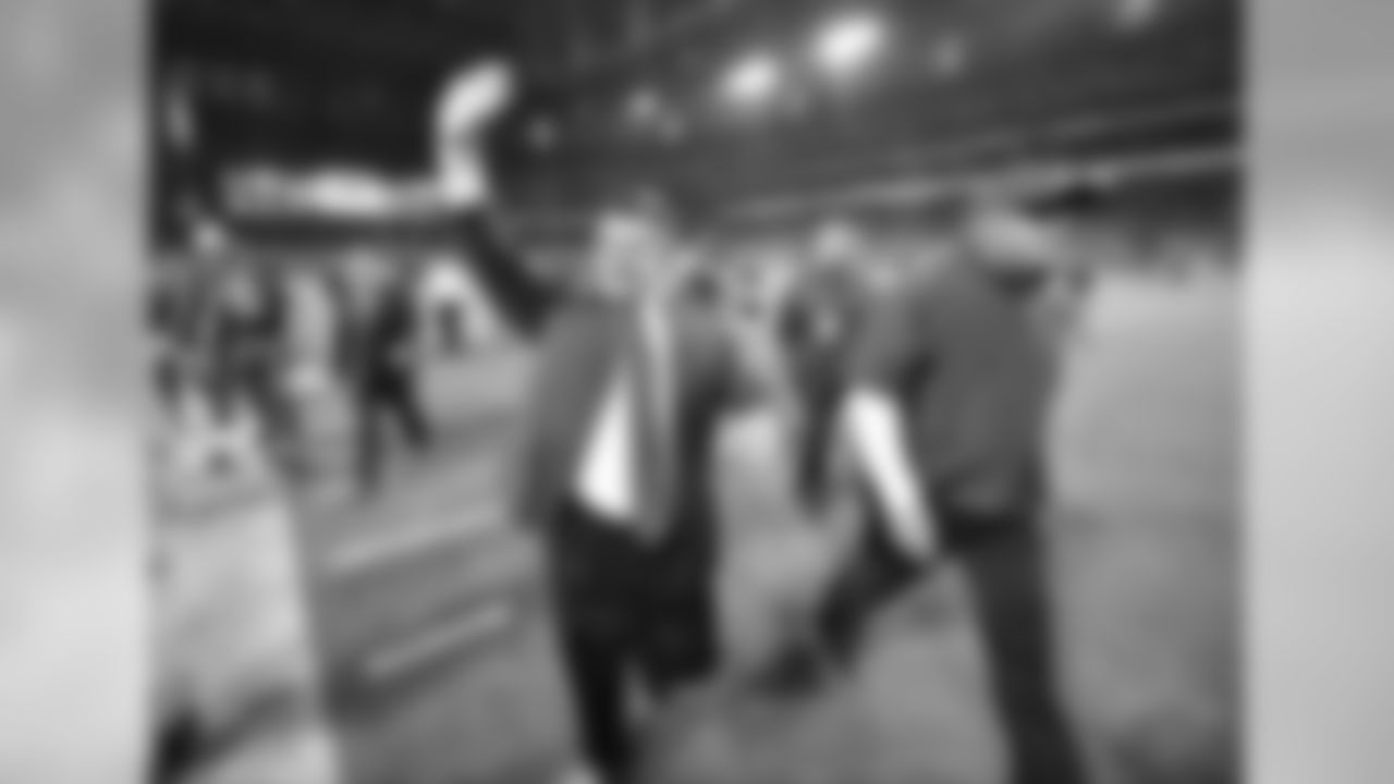 Michael Bidwill waves to the fans after the 17-14 win over the Kansas City Chiefs