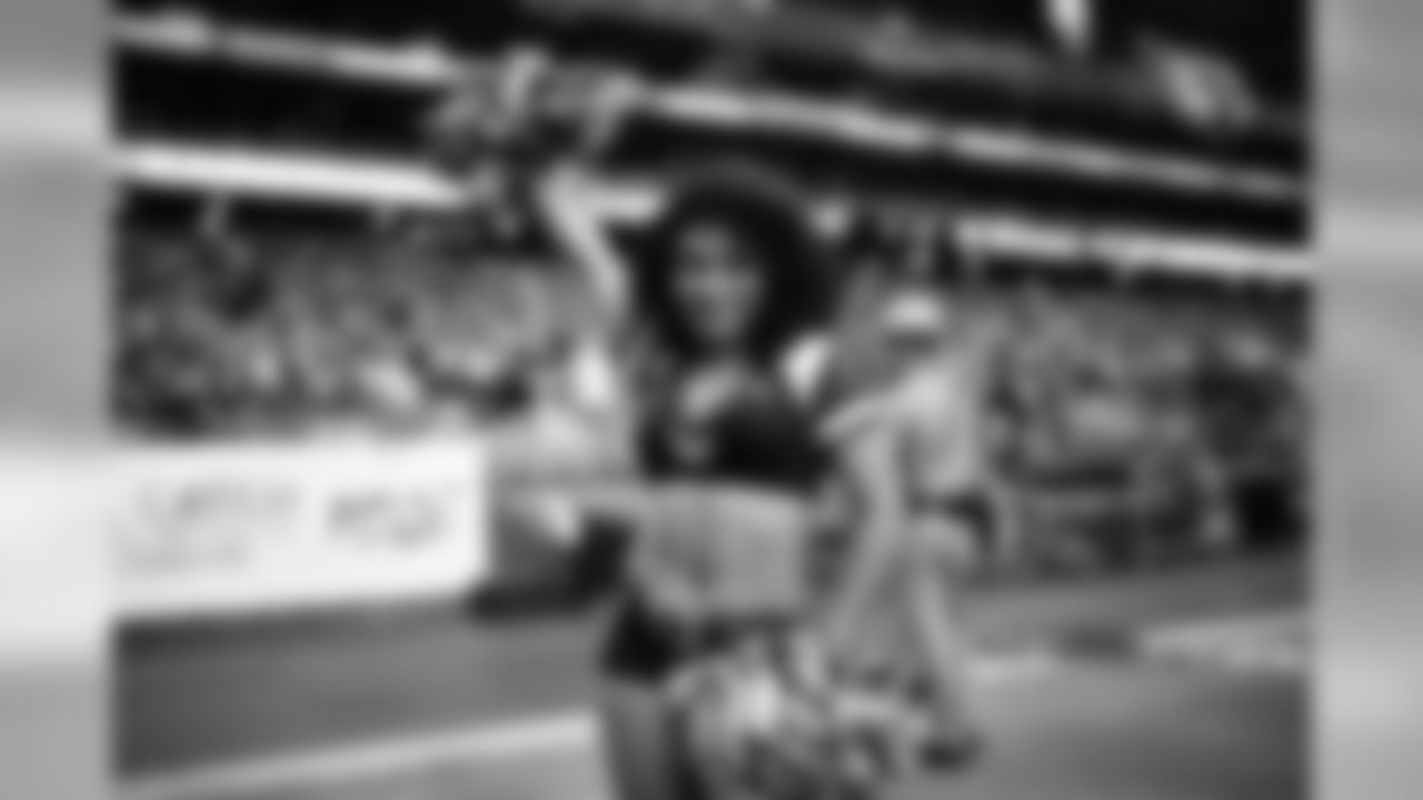 Images of Cardinals cheerleader Tequasia during the 2019 season