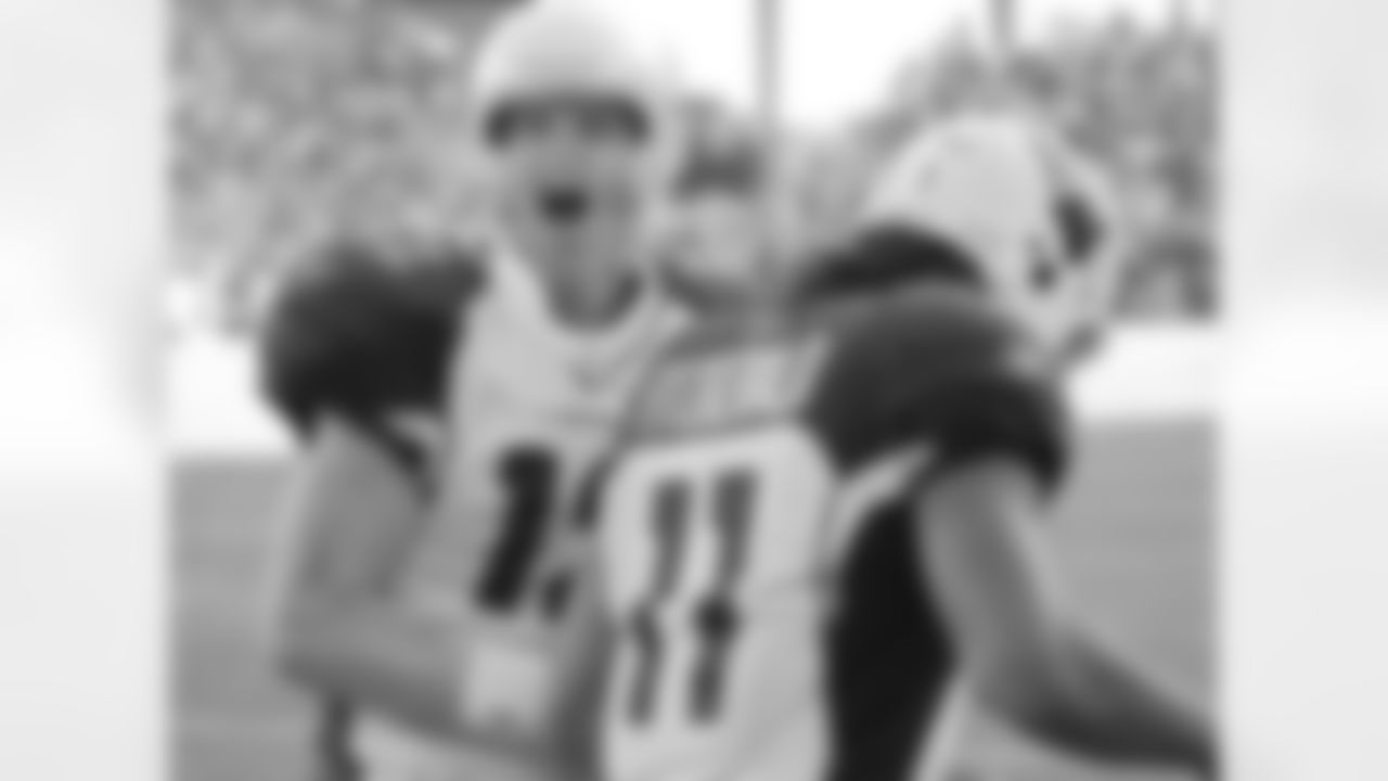 2005: QB Josh McCown celebrates a touchdown pass.