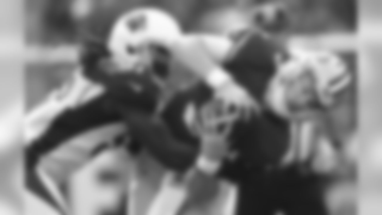 Arizona Cardinals linebacker Josh Bynes (57) sacks San Francisco 49ers quarterback C.J. Beathard (3) during the first half of an NFL football game in Santa Clara, Calif., Sunday, Oct. 7, 2018.