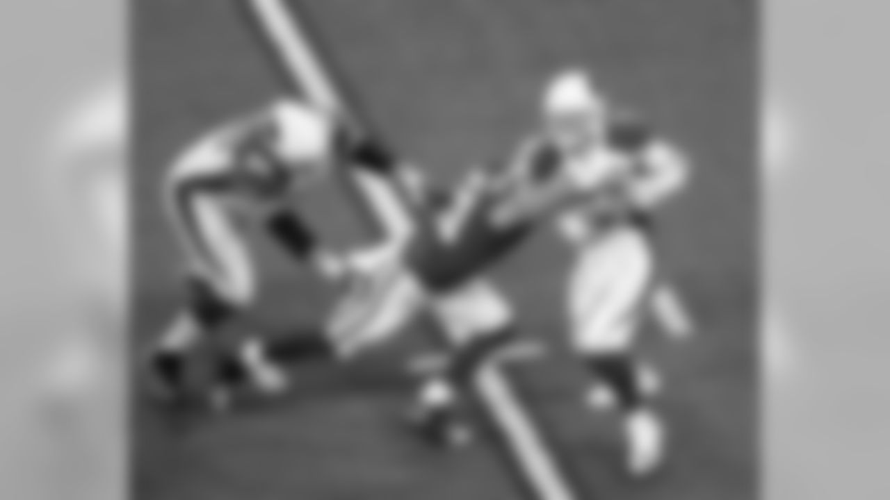 QB Carson Palmer under pressure from the Colts defense