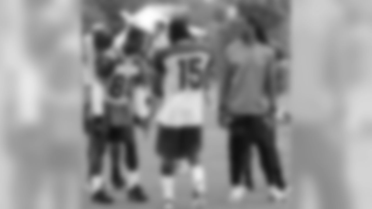 Early Doucet, Steve Breaston and Larry Fitzgerald have a chat