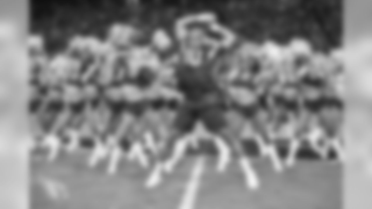 Images of the Cardinals cheerleaders practicing and performing with celebrity fitness motivator Shaun T