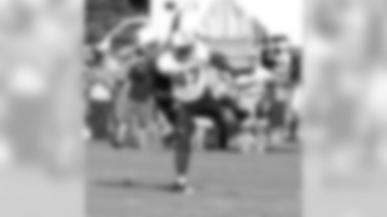 Cornerback Greg Toler breaks up a pass to receiver Lavelle Hawkins