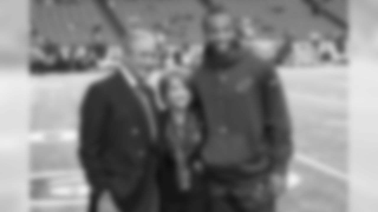 Larry Fitzgerald poses with Falcons owner Arthur Blank