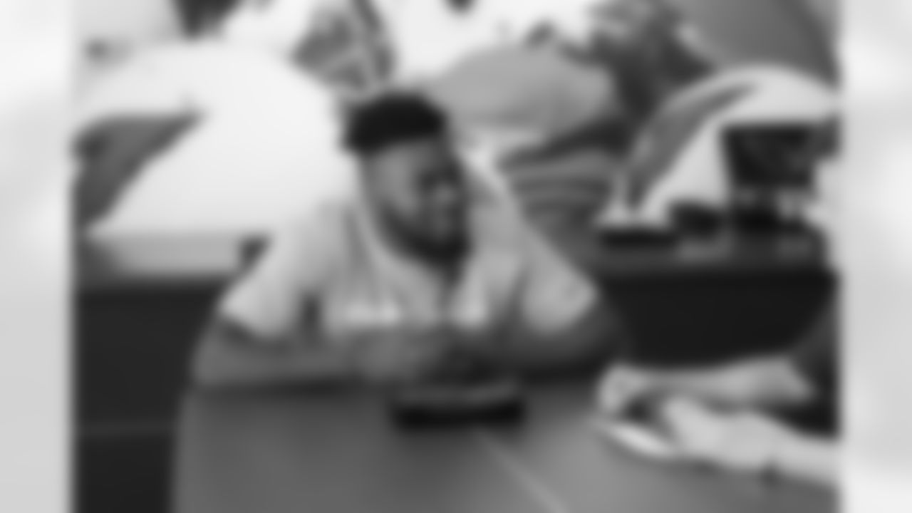 Fifth-round pick RB T.J. Logan prepares to sign his contract