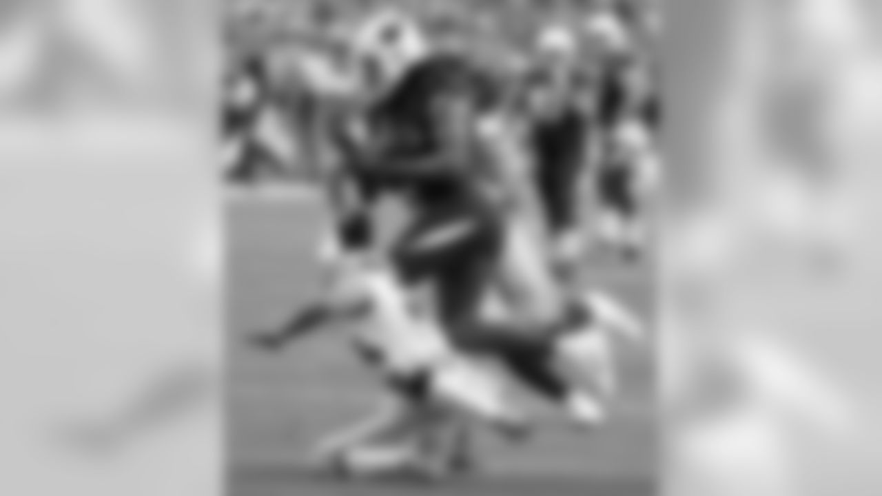 Larry Fitzgerald runs for extra yardage after the catch