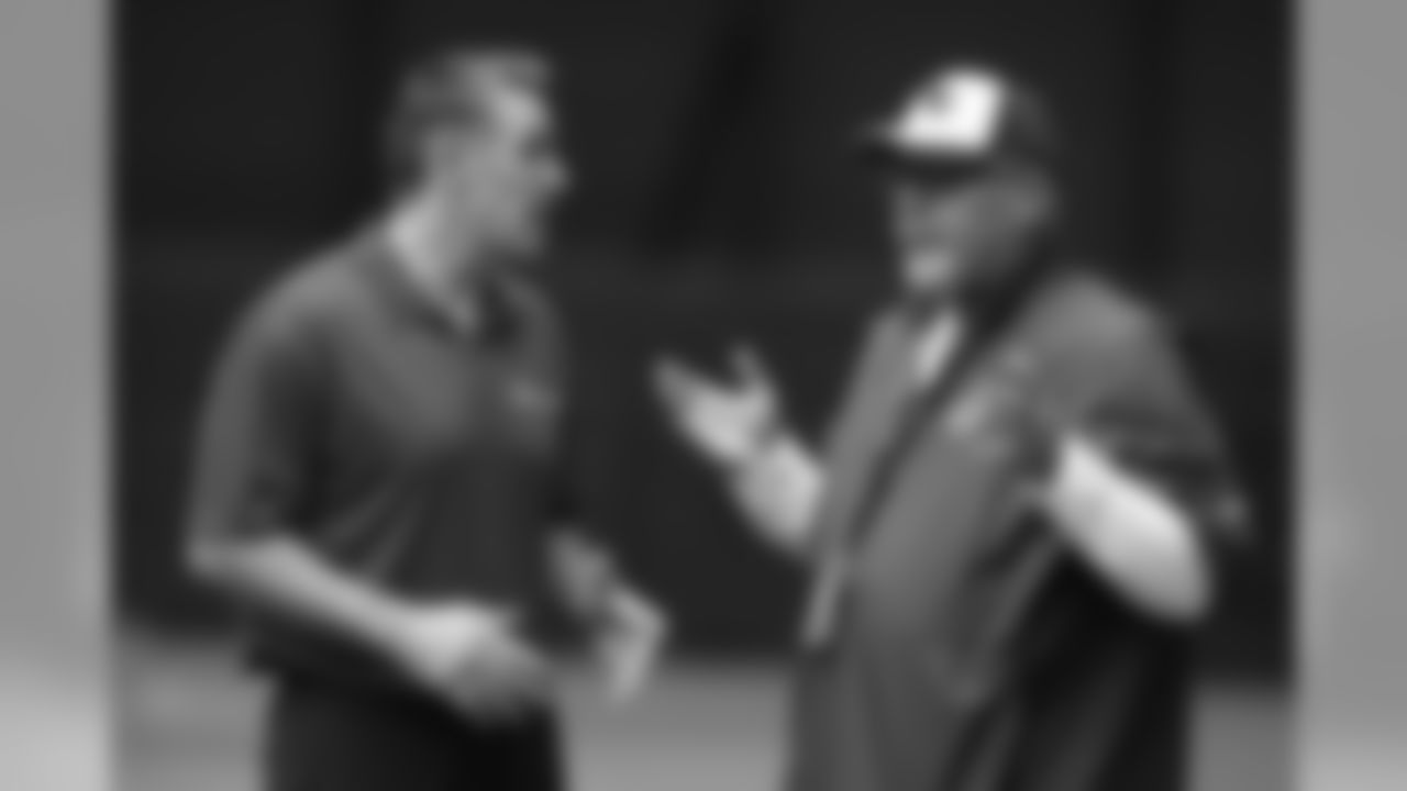 Warner with coach Bruce Arians at training camp before the 2014 season