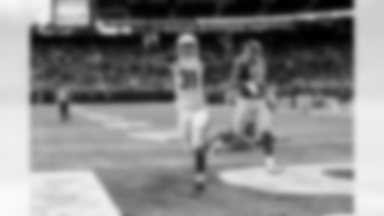 Johnson celebrates a touchdown against the Rams