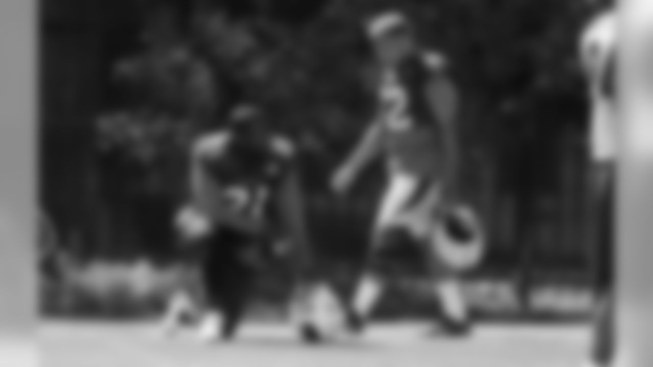 S Tyrann Mathieu walks past CB Patrick Peterson