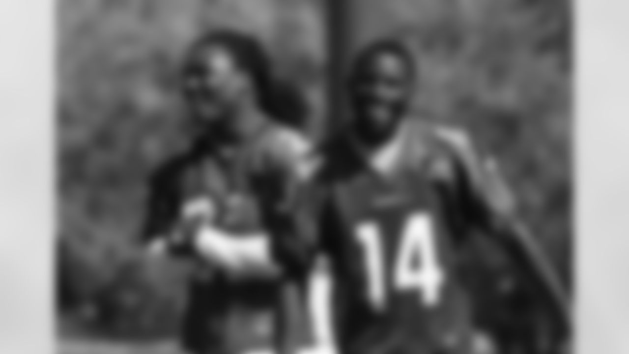 RB Chris Johnson (left) and WR J.J. Nelson share a laugh