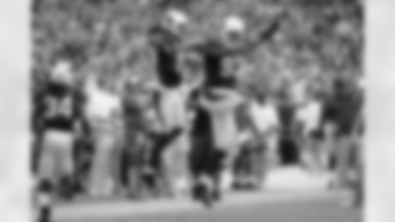 Calais and Larry Fitzgerald chest bump